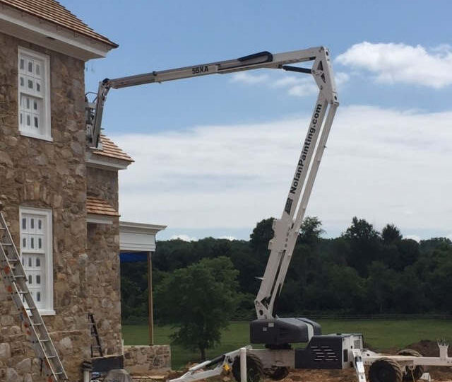 crane to paint exterior of home