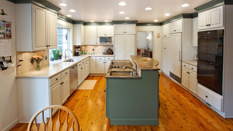 Green cabinets and trim, white cabinets